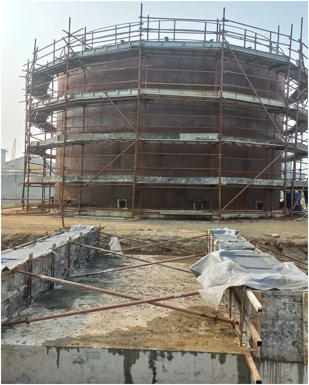 Storage tank under scaffolding