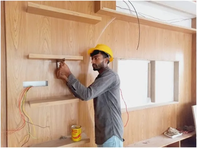 Wall panel fitting